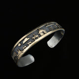 Brazalete navajo de plata de ley y oro FJ Henry Storyteller